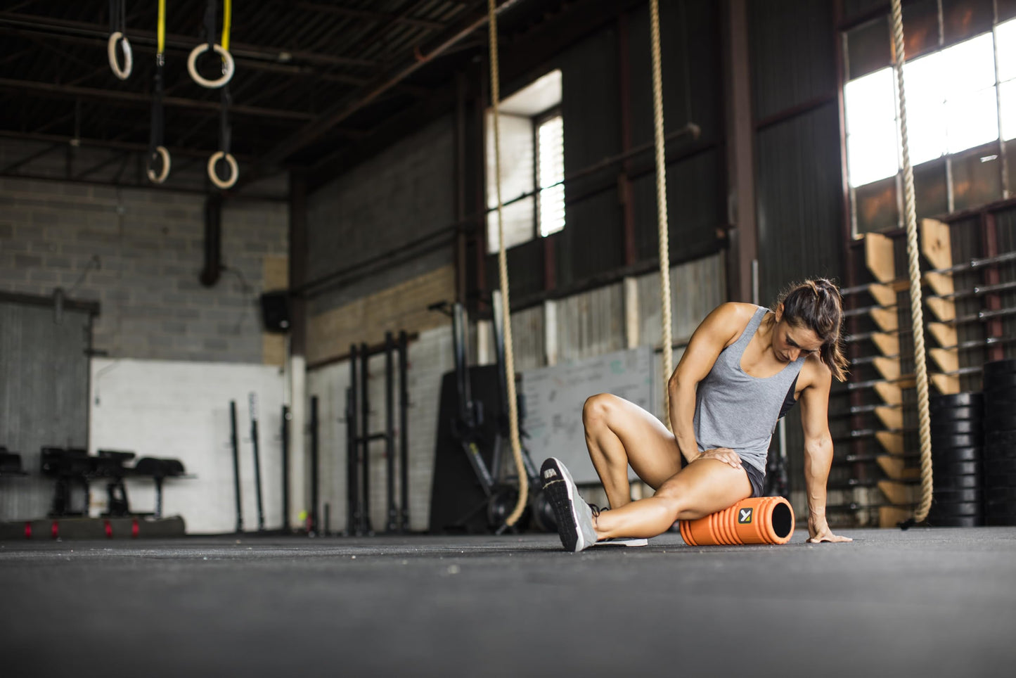 TriggerPoint Grid Foam Roller - Multi-Density Exterior, Rigid Core - Trusted by Therapists and Athletes - Standard Density, includes Online Instructional Videos