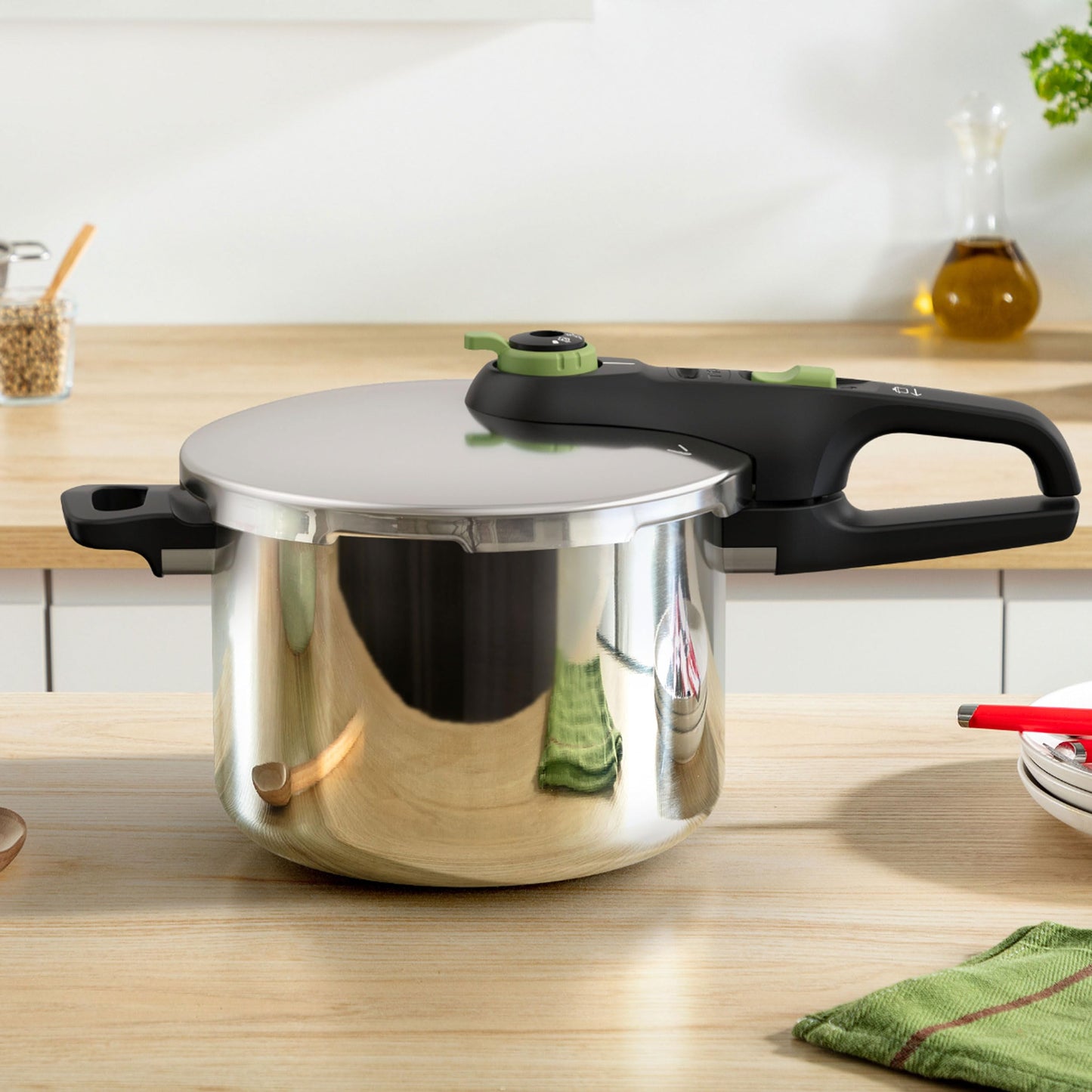 Tefal Secure Trendy Pressure Cooker | 2-Level Cooking Regulator: Intensive Level 117 °C, Gentle Level 112 °C | Induction Capsule Base | For All Hobs | Short Handle | Stainless Steel/Black/Green